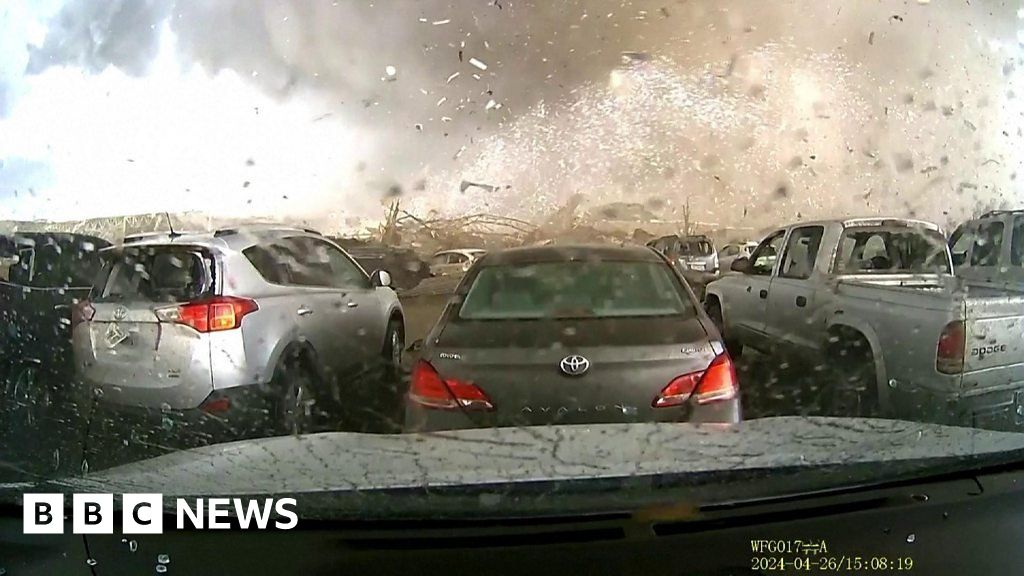 Dashcam shows tornado obliterate Nebraska building