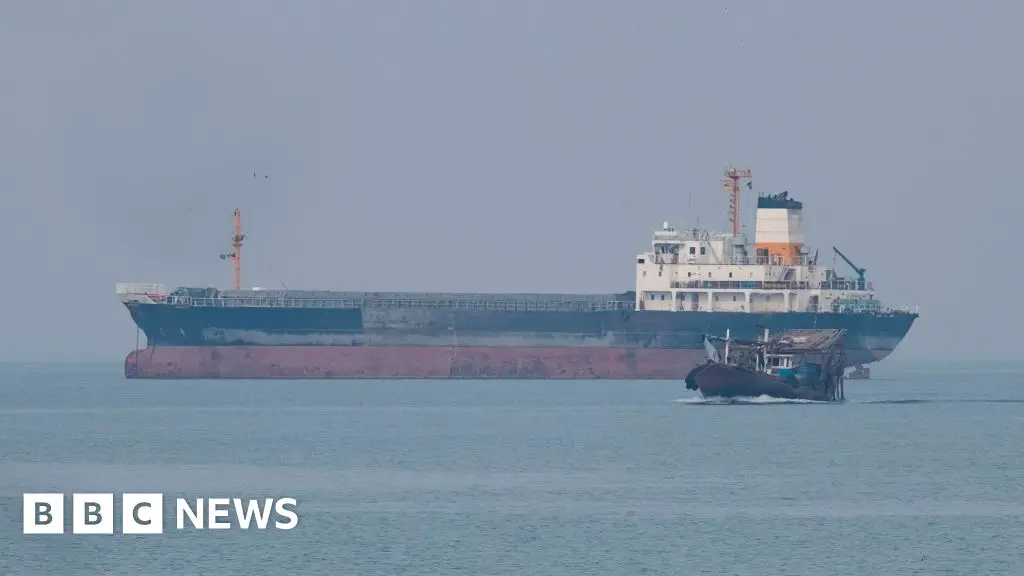 Search continues for missing crew of capsized oil tanker