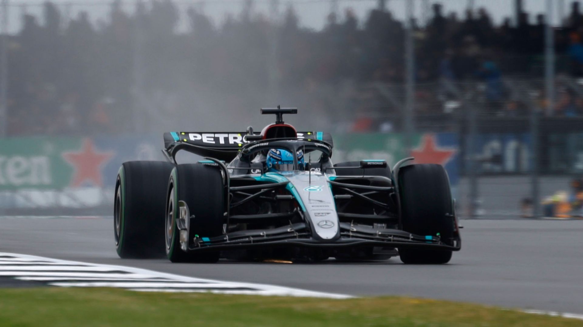 Russell tops Hamilton in wet ahead of British GP qualifying