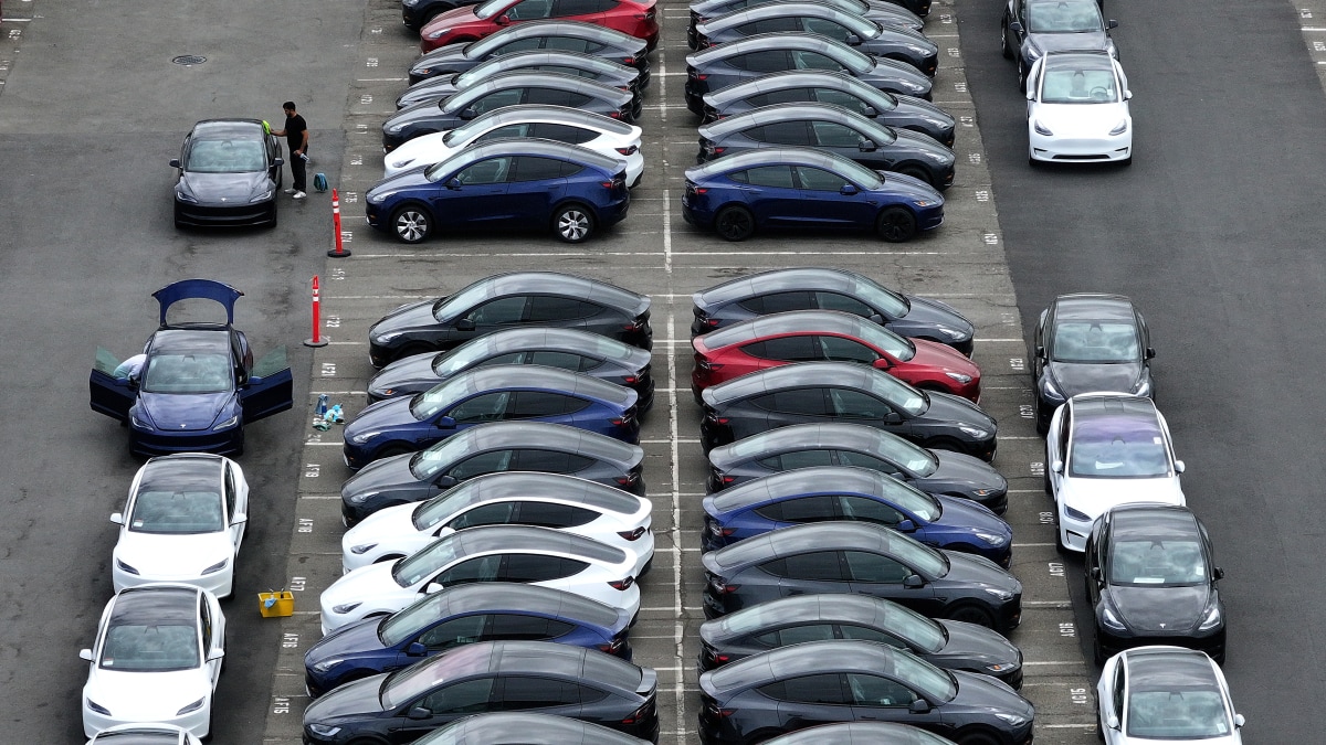 Tesla beats delivery estimates with less-drastic drop in EV sales